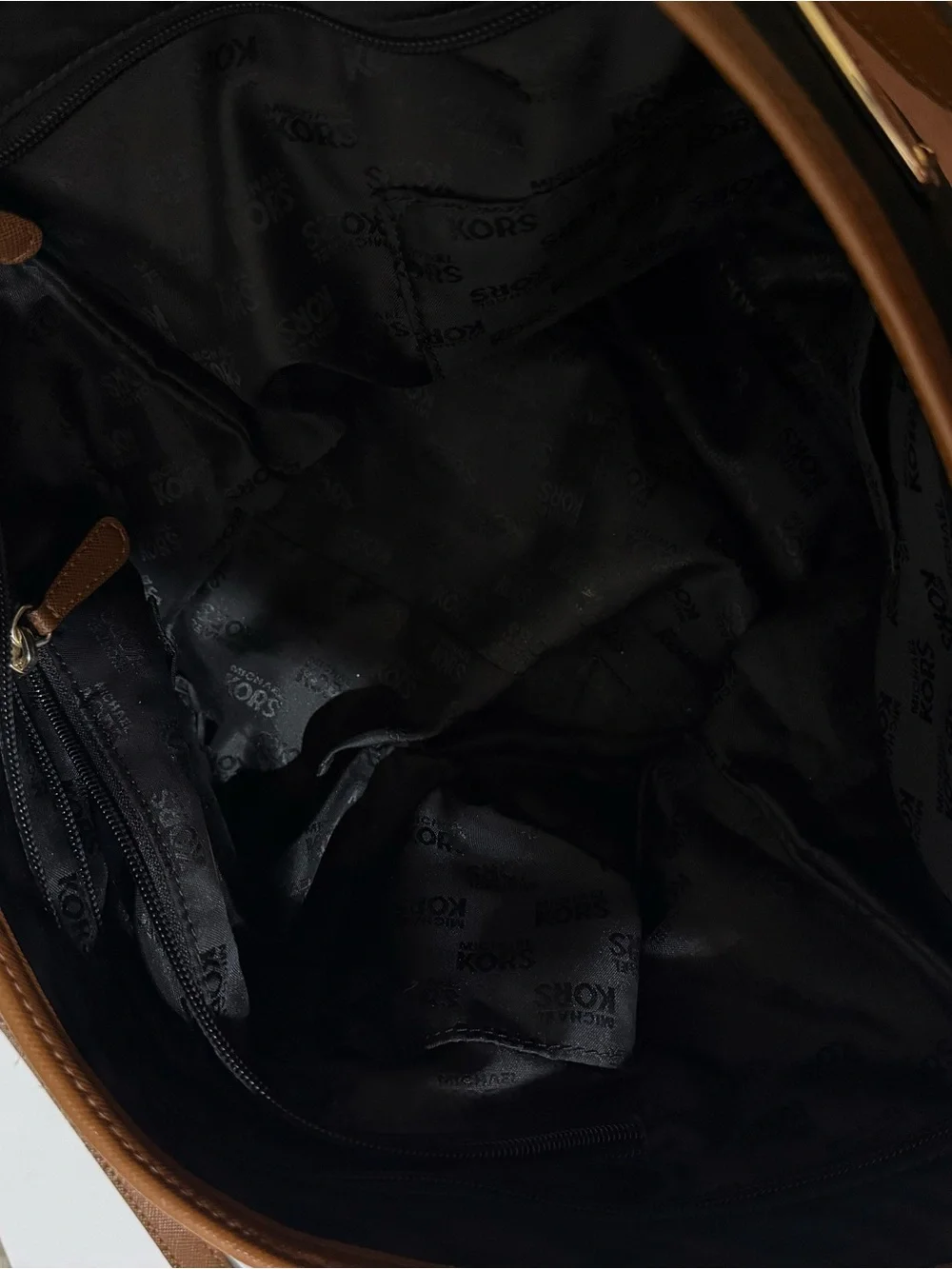 Michael Kors Black Tote with Brown Trim and Gold Plate